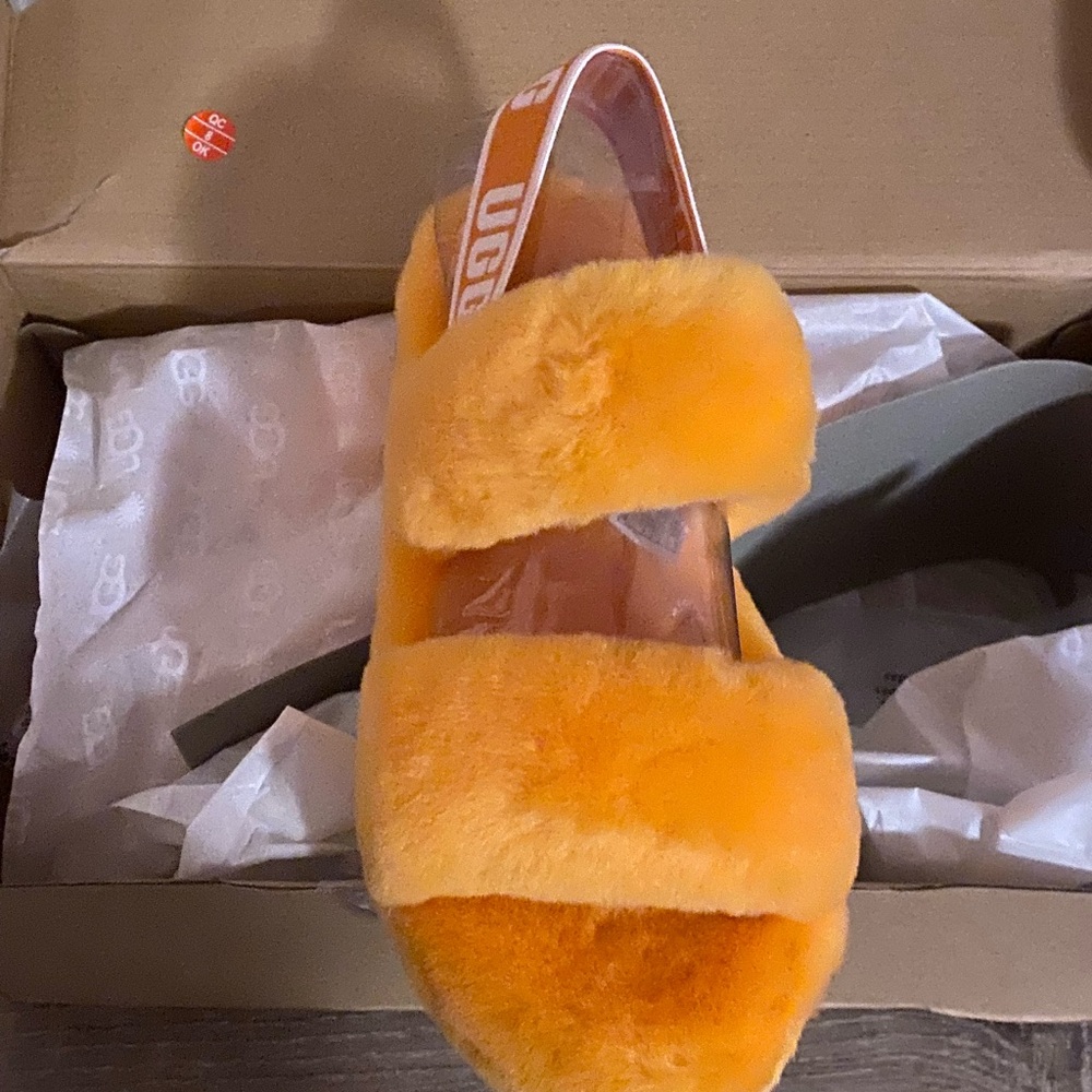 Ugg slides, size 6 orange, never worn